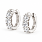 14k gold lab-grown diamond hoops on white background