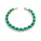 Turquoise and Emerald Tennis Bracelet in 14K gold